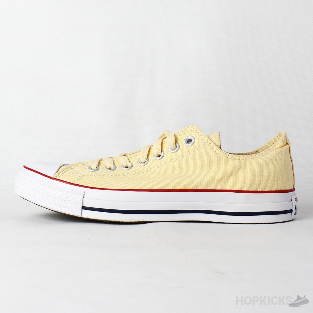 Cream low top converse deals